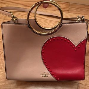 Kate Spade pale pink leather purse bracelet handbag with red heart. Gold accents